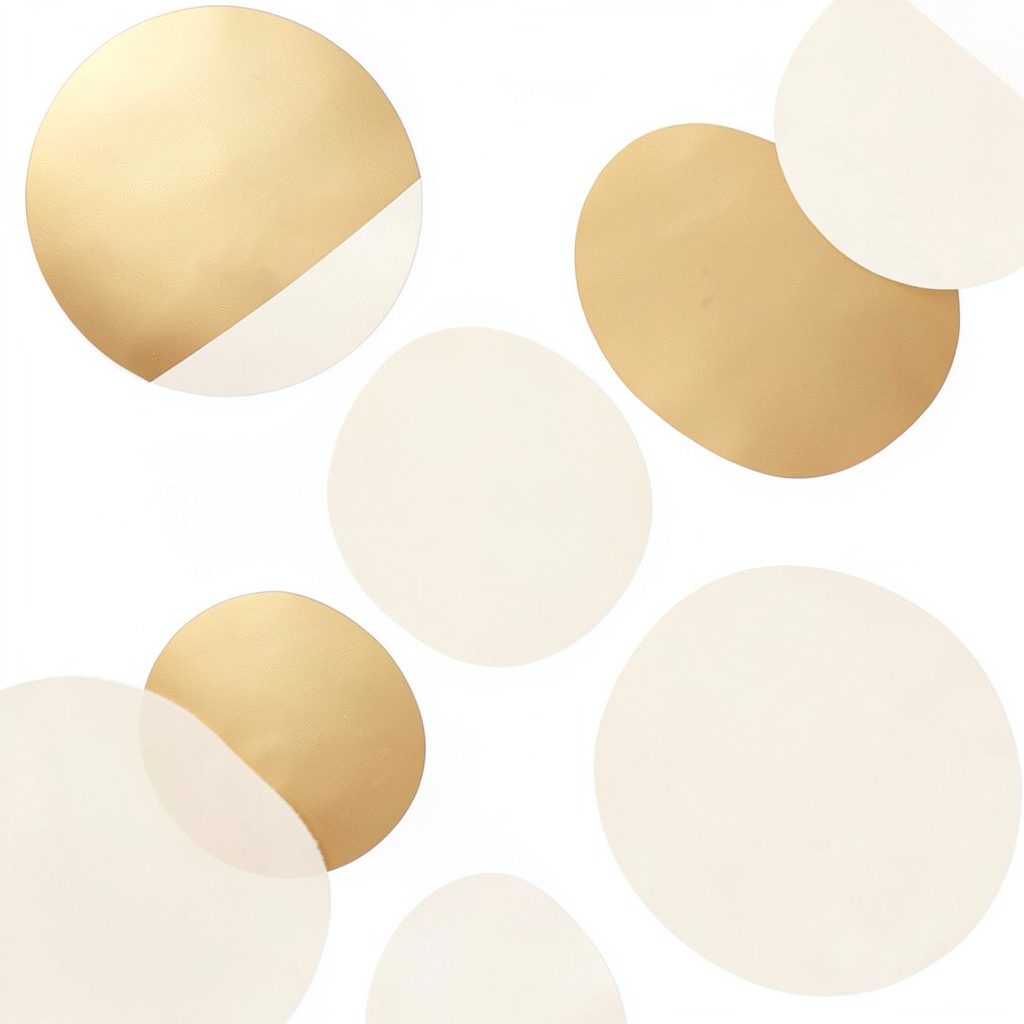 Soft warm-toned abstract circles in gold and cream on a white background